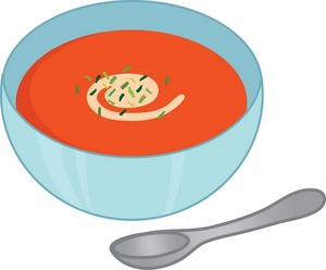 a healthy bowl full of tomato soup with a soup spoon